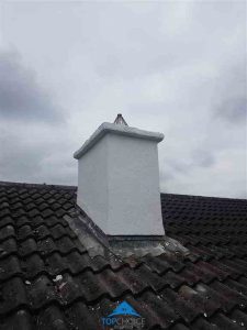 Chimney after being repaired and repainted with new nest